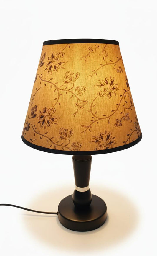 Flower symbol beside bedroom table lamp HD020